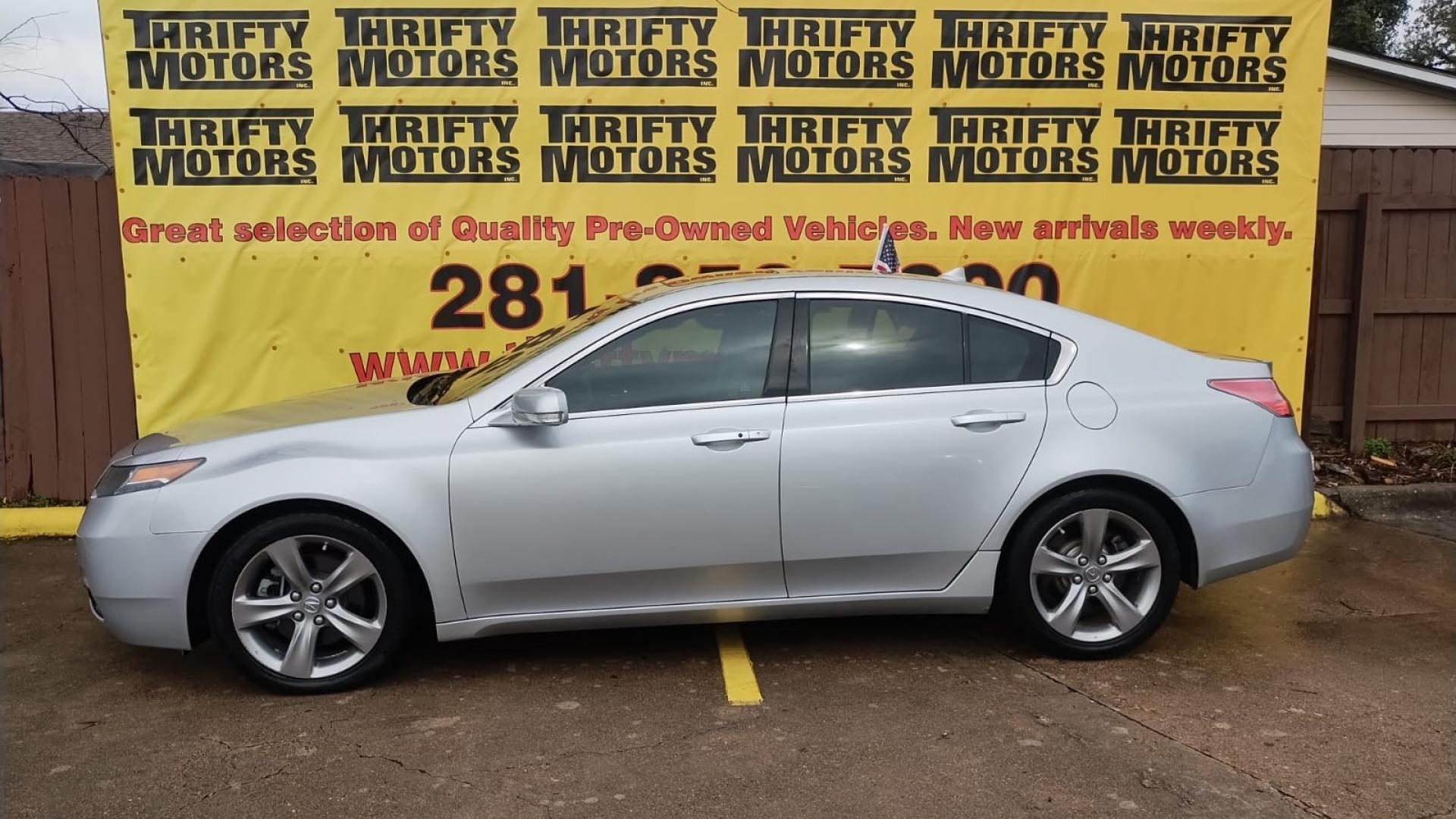 2013 Acura TL (19UUA8F78DA) , located at 16710 Clay Rd., Houston, TX, 77084, (281) 859-7900, 29.834864, -95.656166 - Photo#0